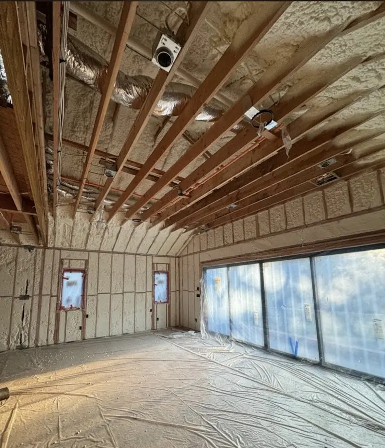 Interior walls and ceiling insulated with spray foam during new construction in Lynwood